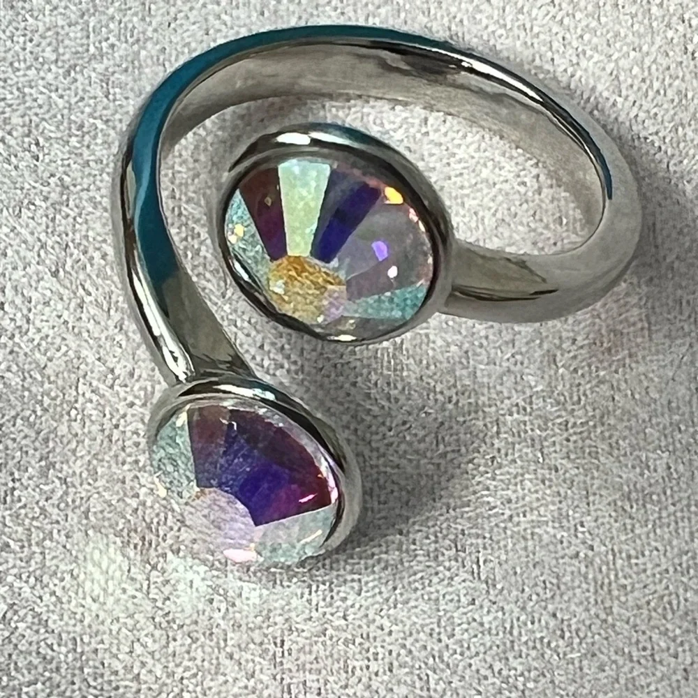 Curled up ring with two Swarovski crystals in Aurore Boreale fits size 6-7 BNIB